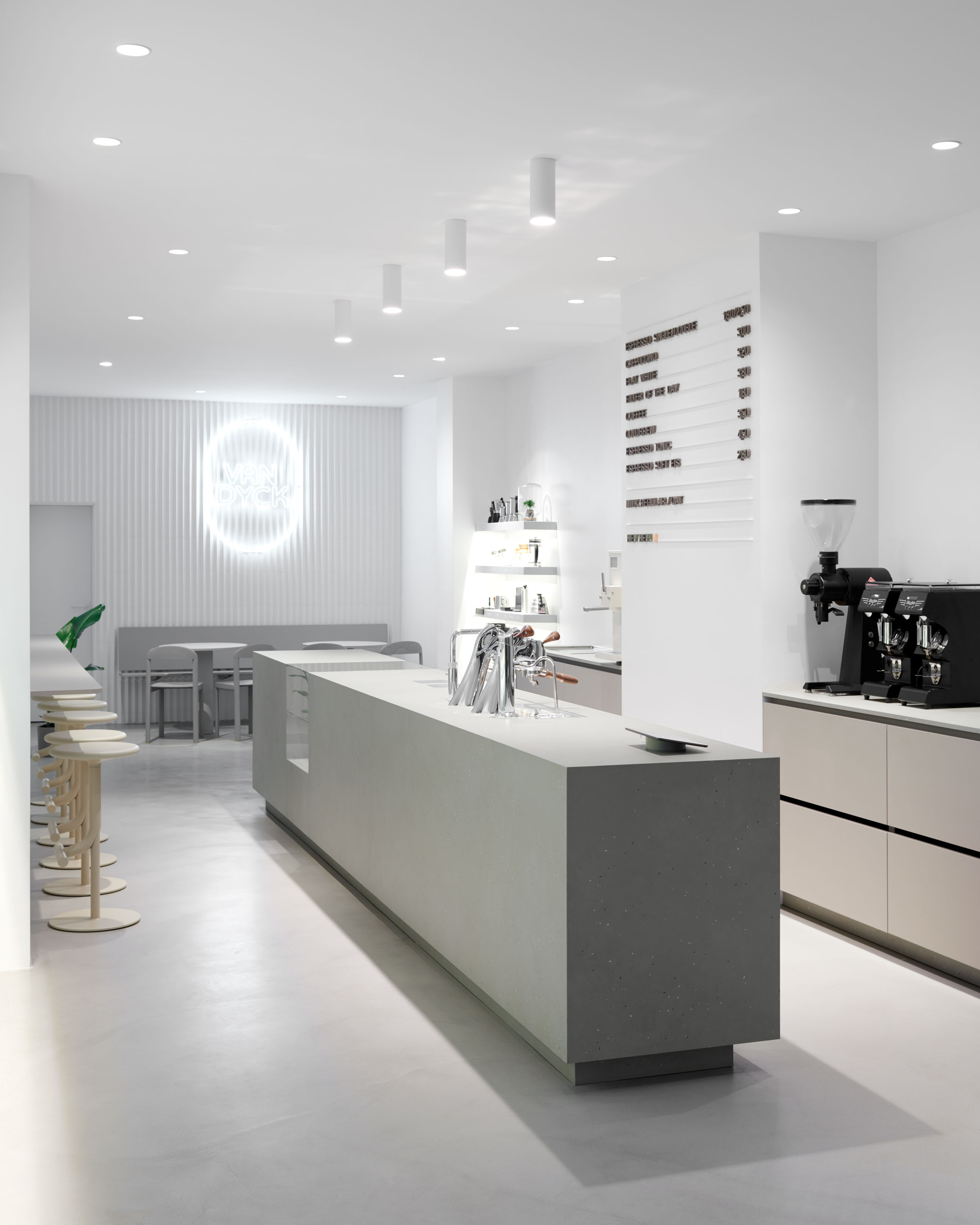 A modern, minimalist home coffee bar , featuring a sleek espresso